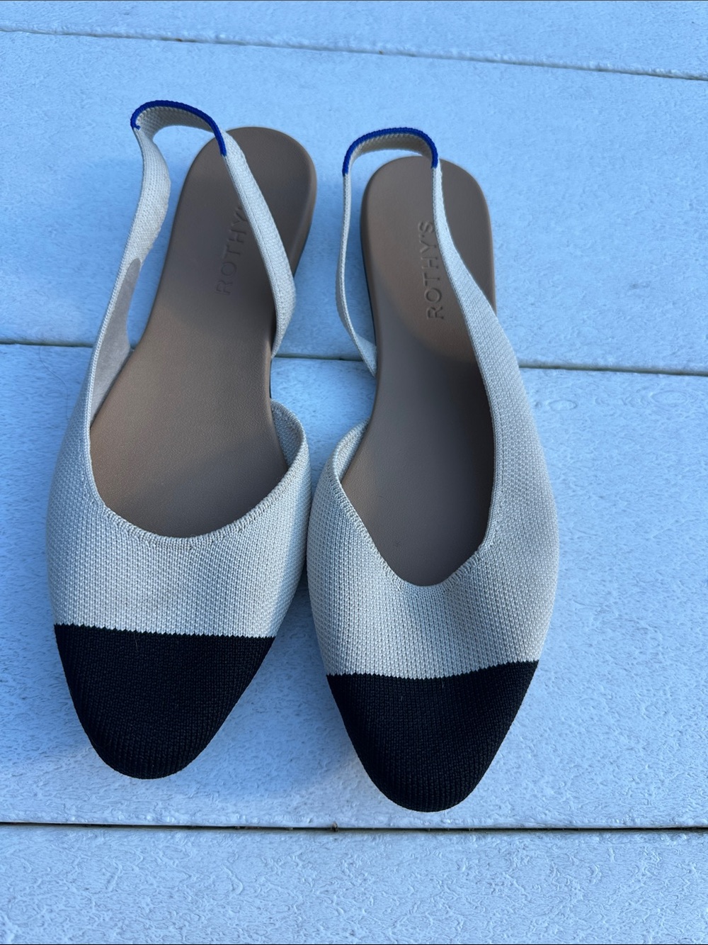Rothy's Two-Tone Pointed Slingback Flats in Ivory and Black